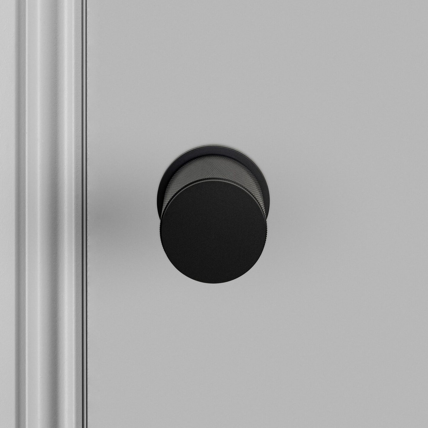 Buster and Punch Door Knob on Round Rose Cross-Knurl Pattern - Available in Various Finishes