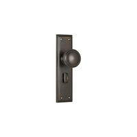 Out of Stock: ETA Early February - Tradco Milton Knob on Long Backplate Privacy Antique Brass 0724P