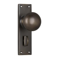 Tradco Victorian Knob on Long Backplate Privacy Antique Brass 0780P