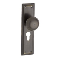 Tradco Richmond Door Knob on Long Backplate Euro Antique Brass 0841E