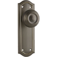 Tradco Kensington Door Knob on Backplate Passage Antique Brass 0856