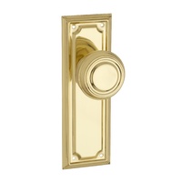 Tradco Edwardian Door Knob on Rectangular Backplate Passage Polished Brass 1056