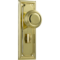 Tradco Edwardian Door Knob on Rectangular Backplate Privacy Polished Brass 1056P