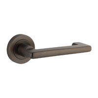 Iver Baltimore Return Door Lever Handle on Round Rose Signature Brass 20781