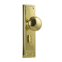 Tradco Milton Door Knob on Long Backplate Privacy Unlacquered Polished Brass 21362P
