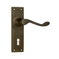 Tradco Victorian Door Lever Handle on Long Backplate Bitkey Antique Brass 0783