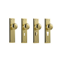 Tradco Richmond Door Knob on Long Backplate Polished Brass