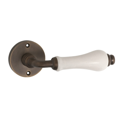Out of Stock: ETA Early February - Tradco Exeter Lever on Rose Ivory Porcelain Antique Brass 50mm 0837