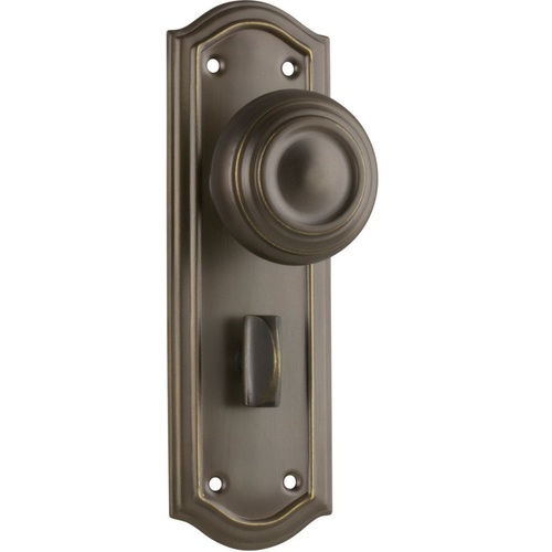 Out of Stock: ETA Early February - Tradco Kensington Door Knob on Backplate Privacy Antique Brass 0856P