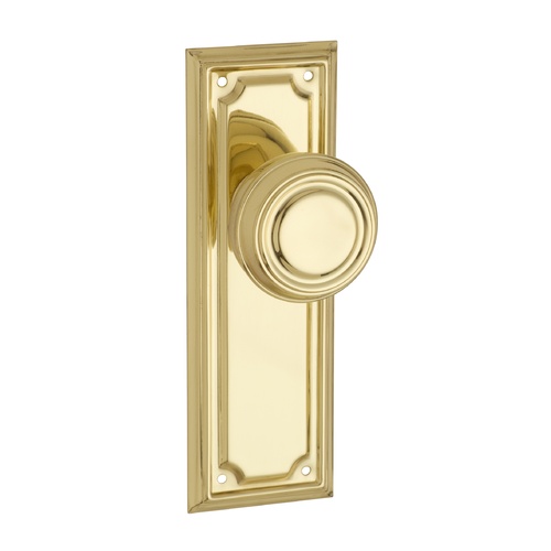 Tradco Edwardian Door Knob on Rectangular Backplate Passage Polished Brass 1056