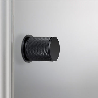 Buster and Punch Door Knob on Round Rose Cross-Knurl Pattern - Available in Various Finishes