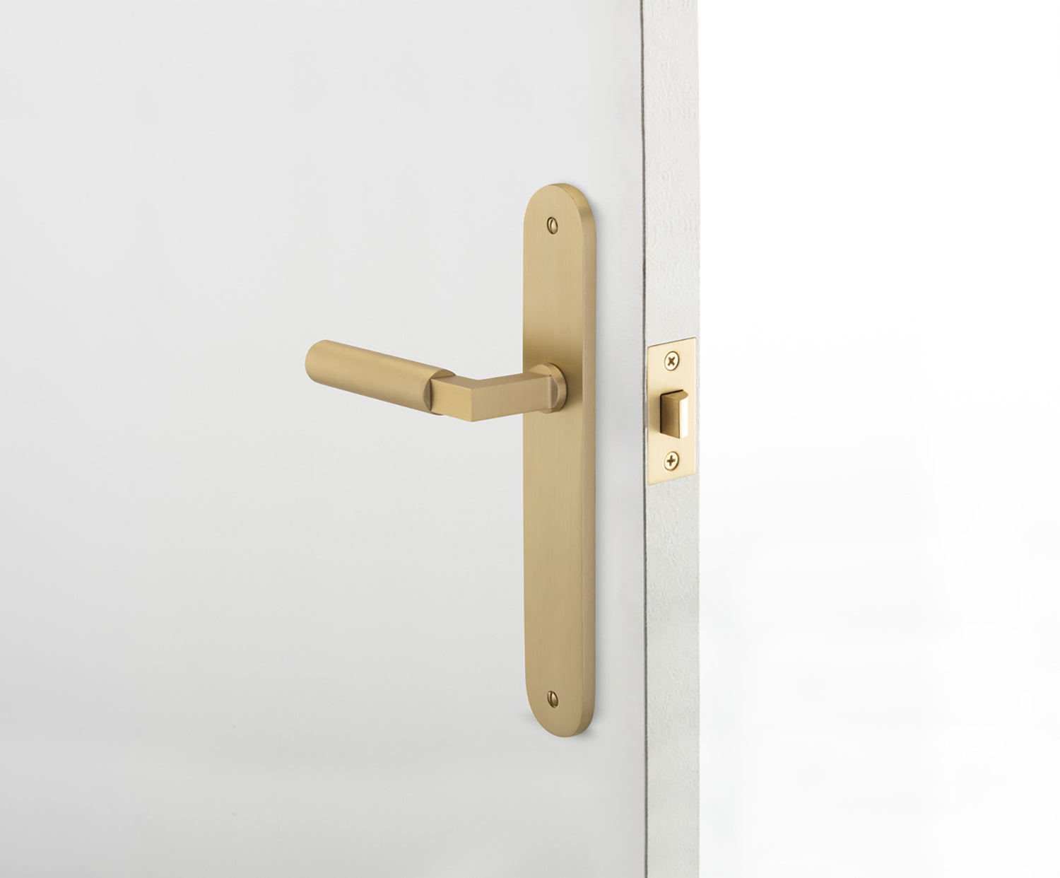 Iver Berlin Door Lever Handle on Oval Backplate Signature Brass