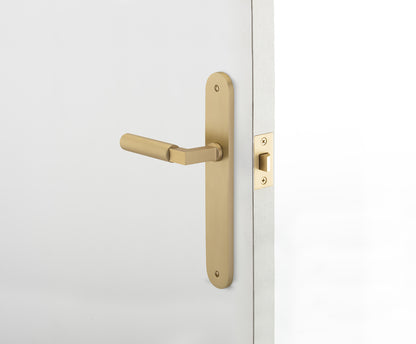 Iver Berlin Door Lever Handle on Oval Backplate Signature Brass