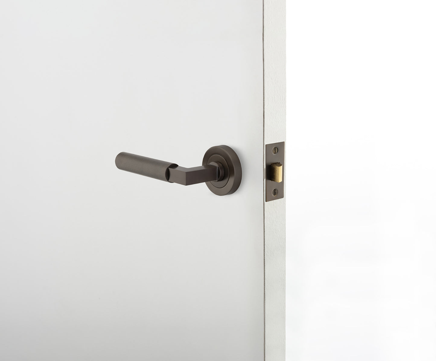 Iver Brunswick Door Lever Handle on Round Rose Passage