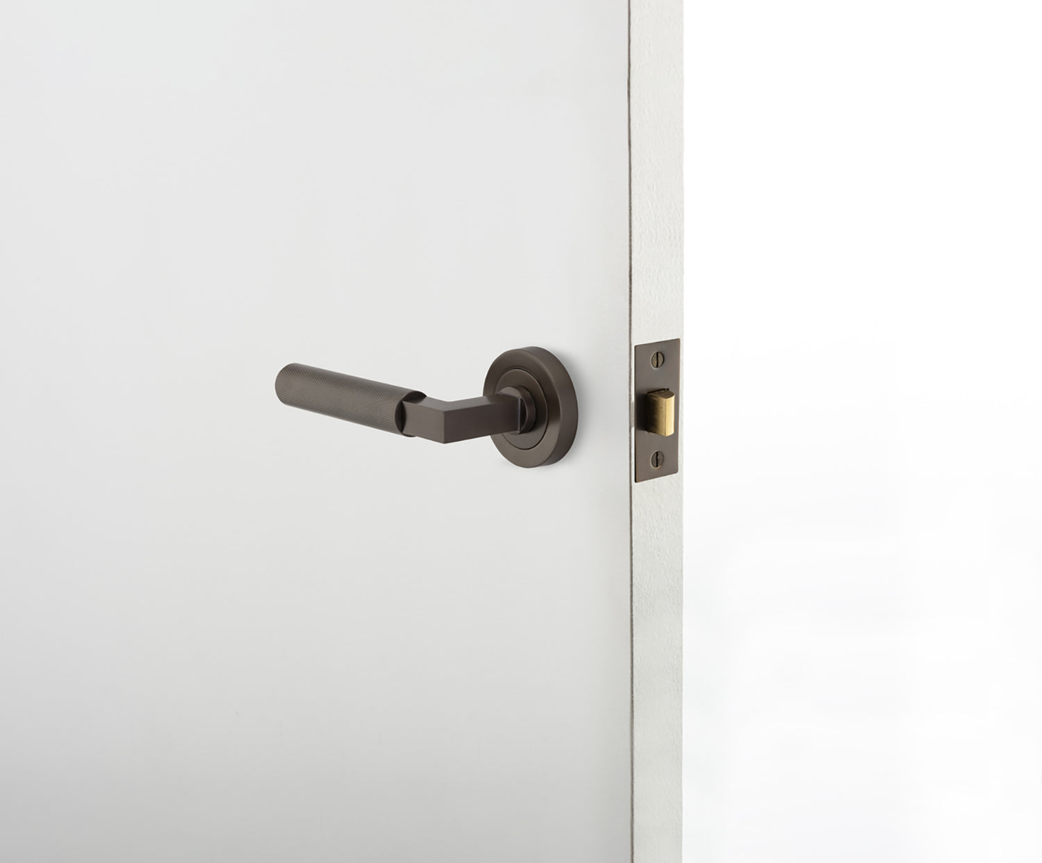 Iver Brunswick Door Lever Handle on Round Rose Passage