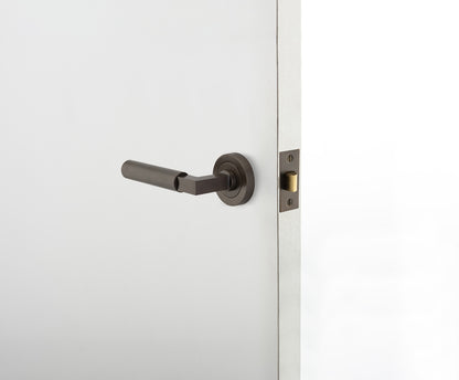 Iver Brunswick Door Lever Handle on Round Rose Passage