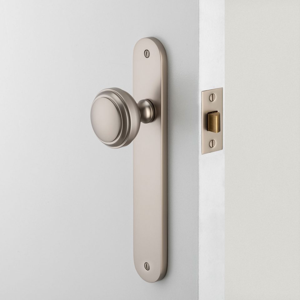 Iver Paddington Door Knob on Oval Backplate Signature Brass
