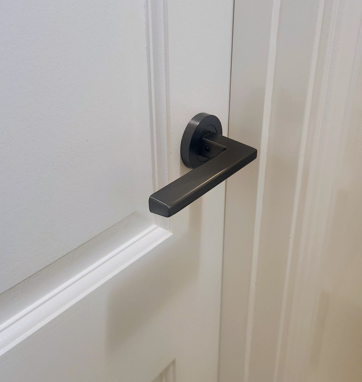 Zanda Vector Door Lever Handle on Round Rose Ember Bronze - Available in Various Functions|ZAN7196EB|ZAN7107EB