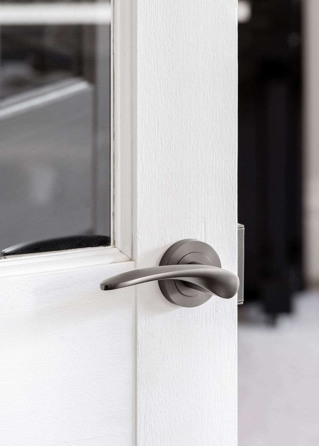Zanda Apollo Door Handle Lever on Round Rose Matt Black