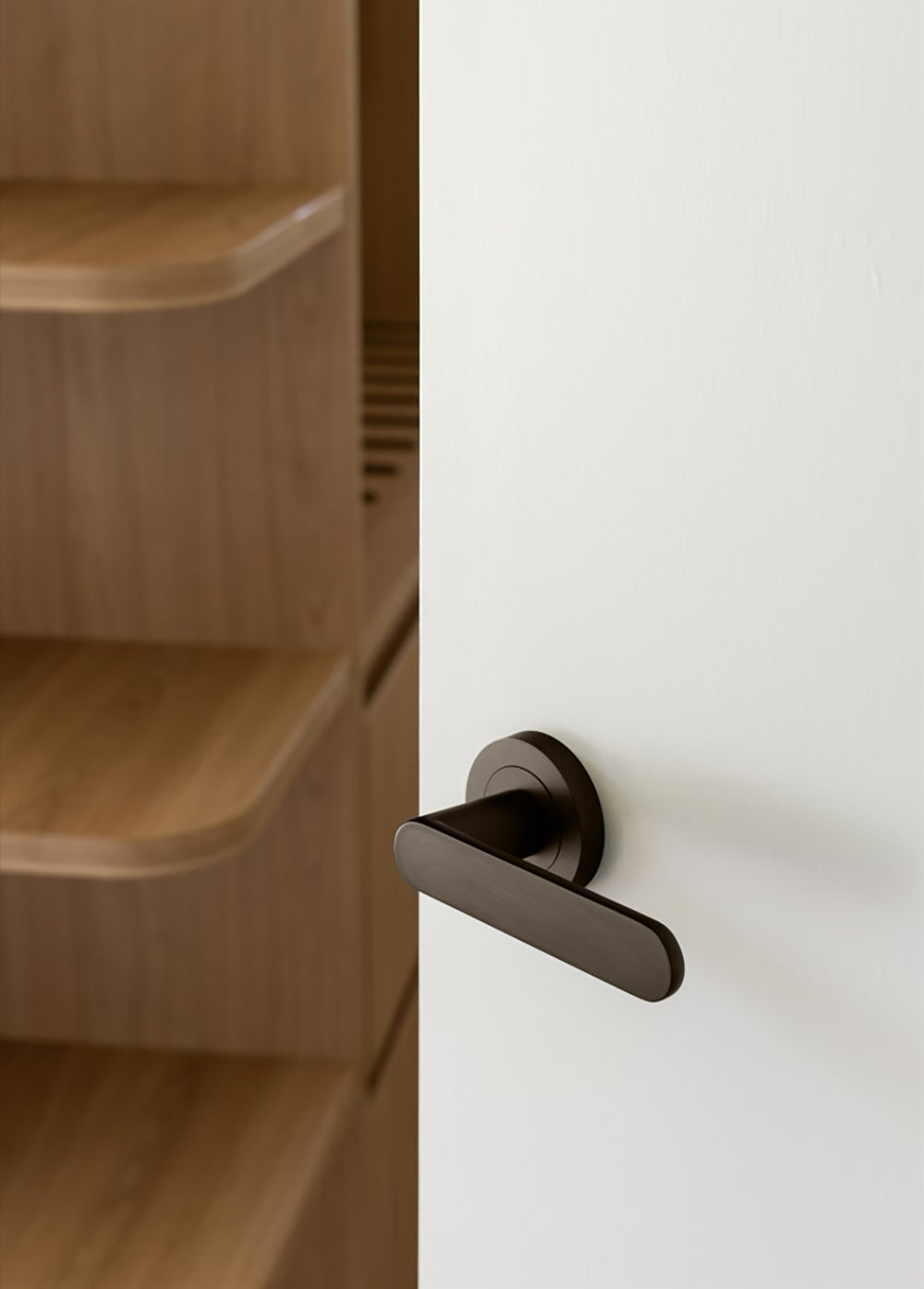 Zanda Duke Door Lever Handle on Round Rose Graphite Nickel